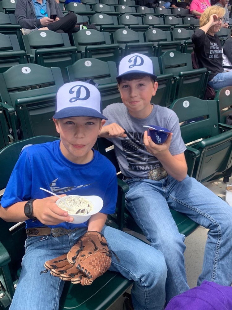 Josh Campbell and Bayne Strick enjoying some ice cream at the Dodger baseball game for their reading trip! 